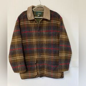 Wool coat with leather collar.